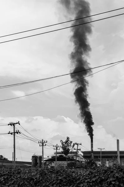 Air pollution smoke from factory, Thailand (Black and white)