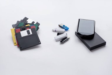 The evolution of digital devices for the transfer and storage of information. Objects isolated on white background. clipart