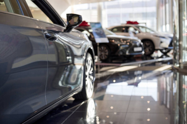 Car auto dealership. Themed blur background.