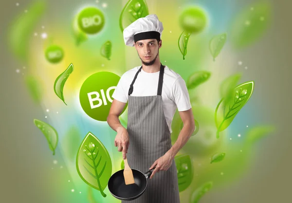 Bio bladeren concept en cook portret — Stockfoto