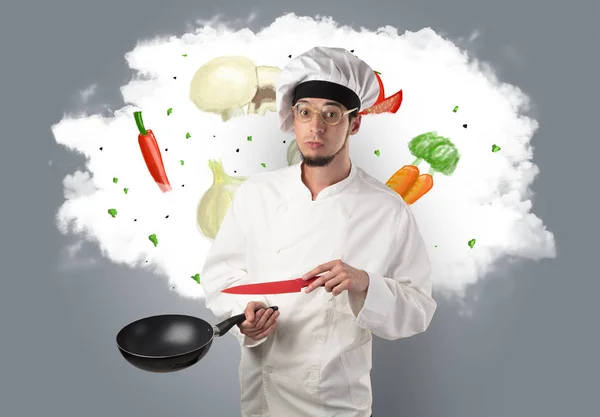 Groenten op wolk met mannelijke kok — Stockfoto
