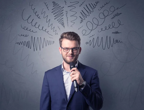 Businessman holding microphone — Stock Photo, Image