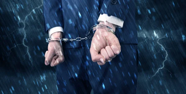 Stormy wallpaper with close handcuffed man — Stock Photo, Image