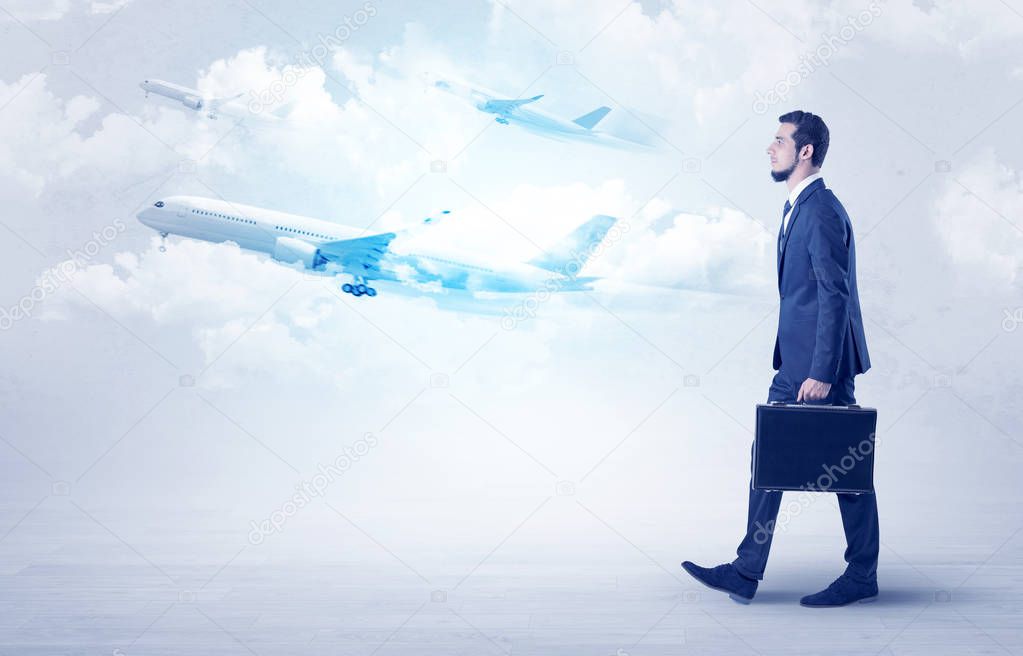 Businessman going somewhere with airplane