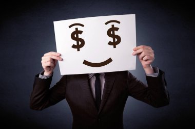 Aç gözlü duygu ile kağıt tutan işadamı 