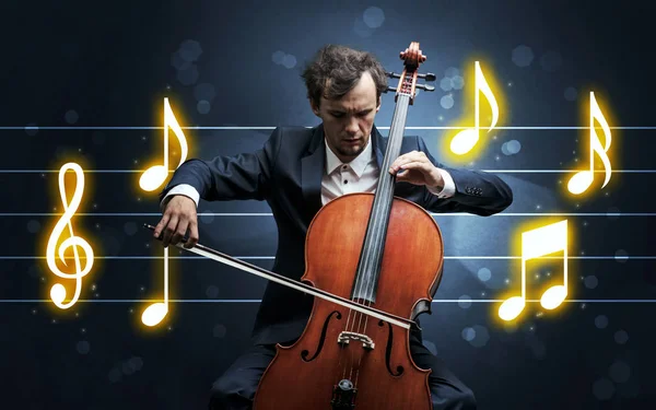 Young cellist with music sheet — Stock Photo, Image