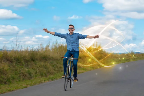 Magical young cyclist riding — Stock Photo, Image
