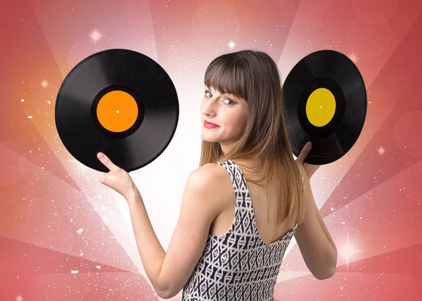 Lady vinyl record te houden — Stockfoto