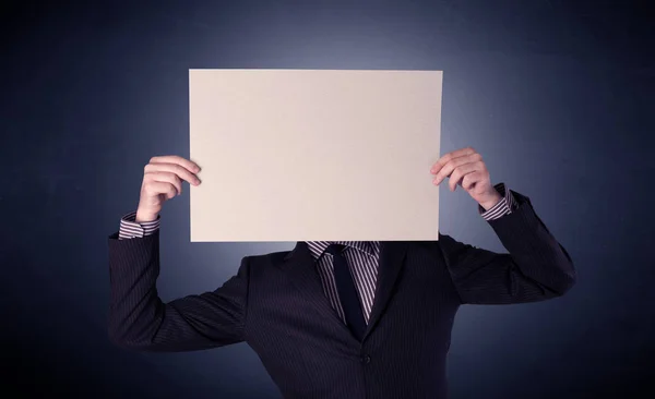 Businessman holding blank paper Stock Photo