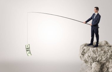 İşadamı Balık tutma Doları bir rock