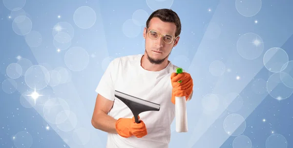 Glittered background with male housekeeper — Stock Photo, Image