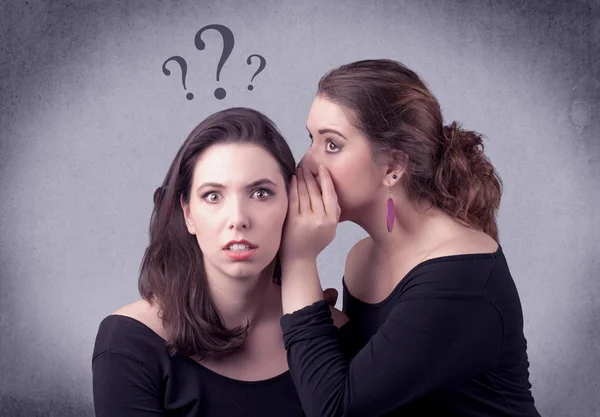 Girl telling secret things to her girlfriend — Stock Photo, Image