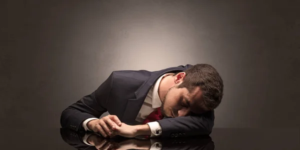 Businessman fell asleep at his workplace