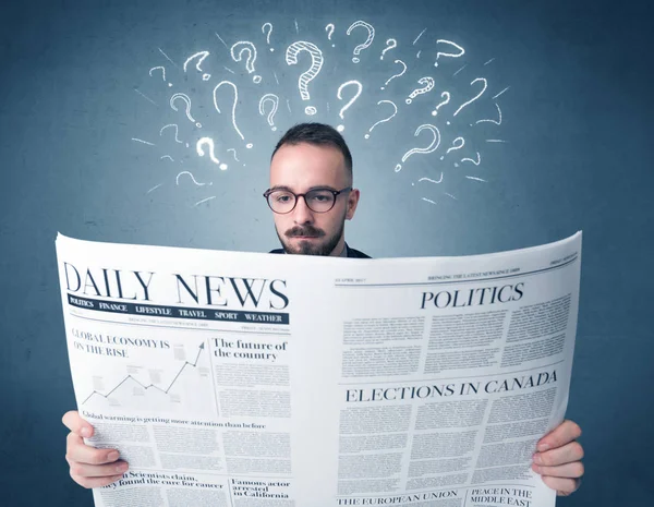 Businessman reading newspaper — Stock Photo, Image