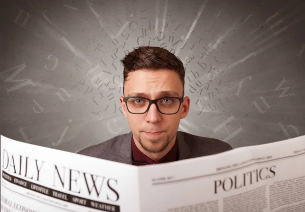 Businessman reading newspaper — Stock Photo, Image