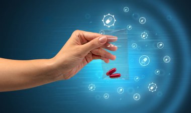 Üzerinde renkli ağrı kesici teslim 