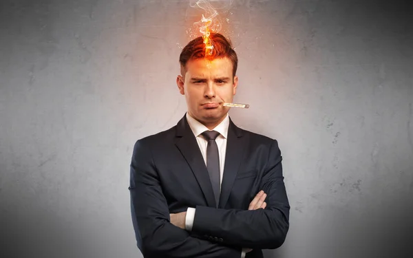 Hombre de negocios enfermo con concepto de cabeza ardiente —  Fotos de Stock