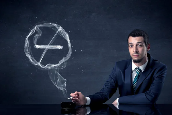 Businessman smoking cigarette. — Stock Photo, Image