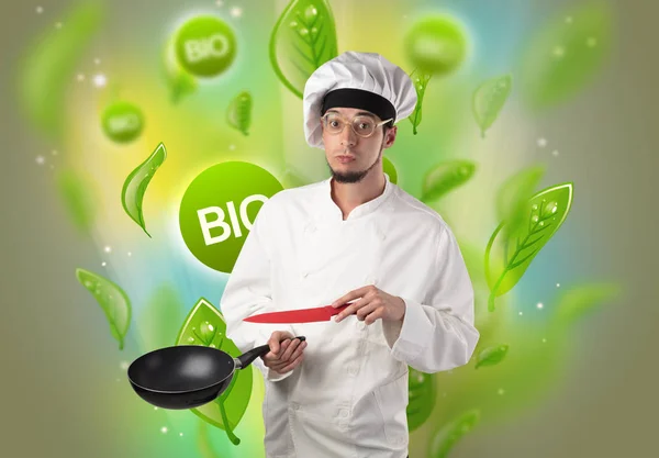 Bio bladeren concept en cook portret — Stockfoto