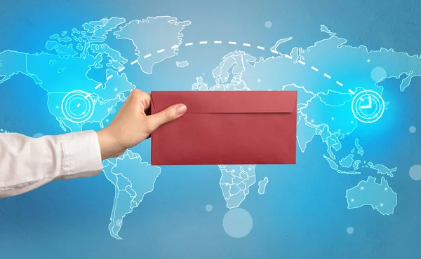 Hand holding envelope with global concept — Stock Photo, Image