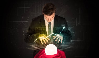 İşadamı borsa sihirli bir top ile geleceği tahmin