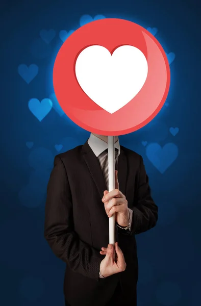 Empresario sosteniendo el cartel del corazón —  Fotos de Stock