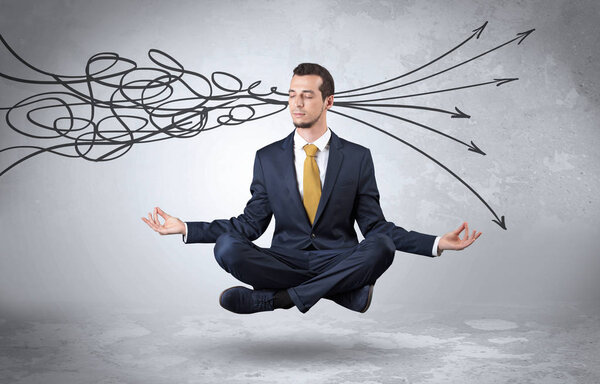 Бизнесмен медитирует с чистой концепцией каракулей
