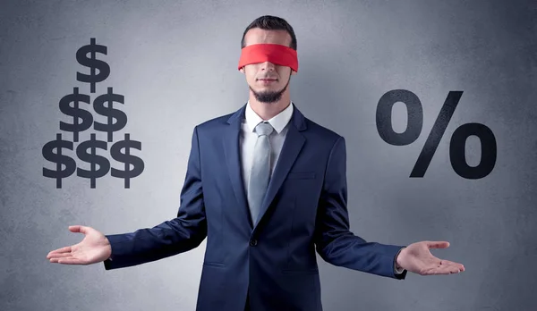 Man with ribbon on his eye holding dollar signs — Stock Photo, Image