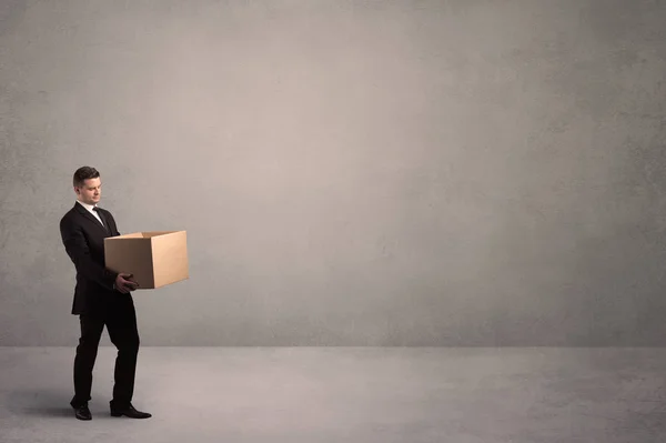 Businessman with empty box — Stock Photo, Image