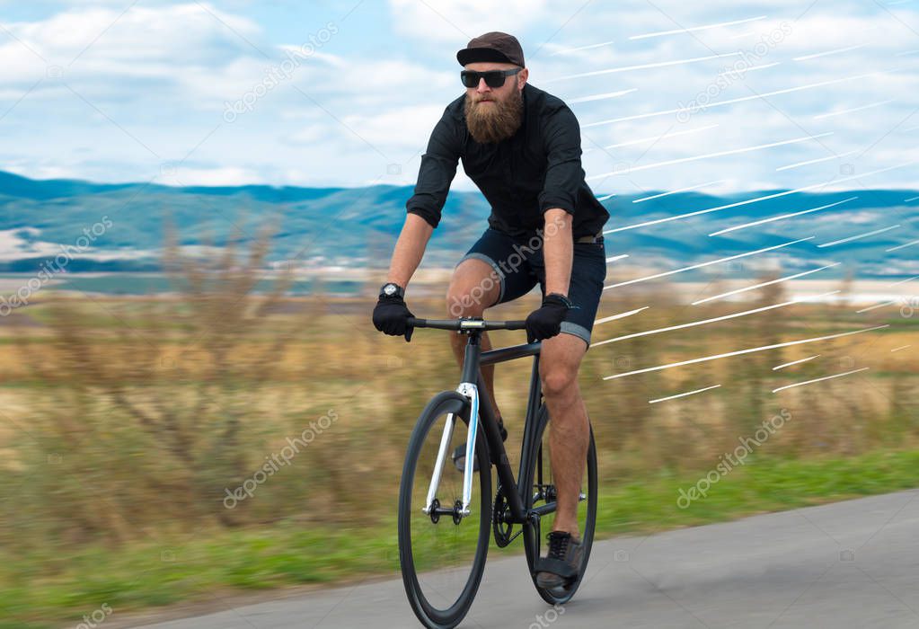 Casual cyclist riding bicycle very fast