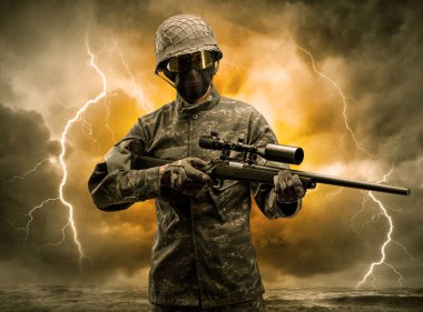 Silahlı asker anlaşılması güç bir havada duran