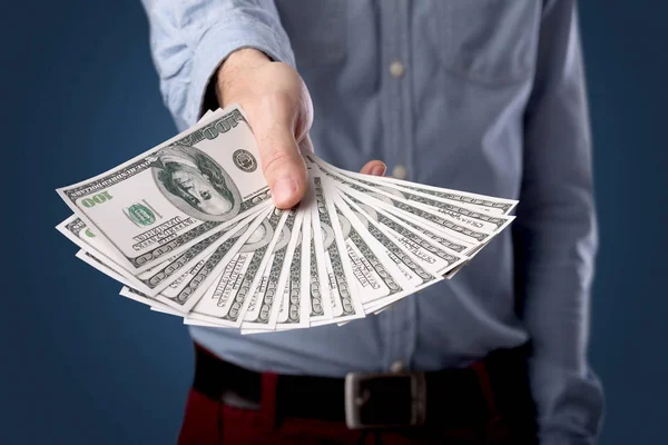 Businessman holding money — Stock Photo, Image