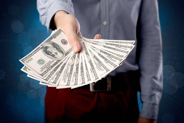 Businessman holding money — Stock Photo, Image