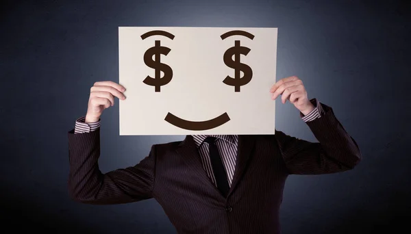 Businessman holding paper with greedy emotion — Stock Photo, Image