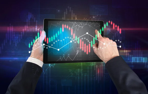 Hand holding tablet with global reports and stock market change concept — Stock Photo, Image