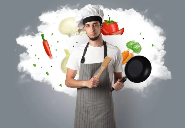 Groenten op wolk met mannelijke kok — Stockfoto