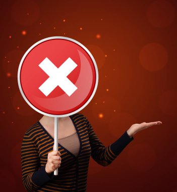 Tutan kadın x işareti