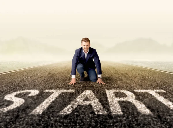 Businessman at start line — Stock Photo, Image