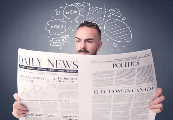 Businessman reading newspaper — Stock Photo, Image