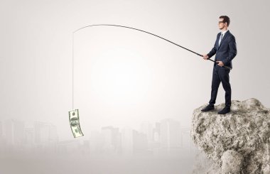 İşadamı Balık tutma Doları bir rock