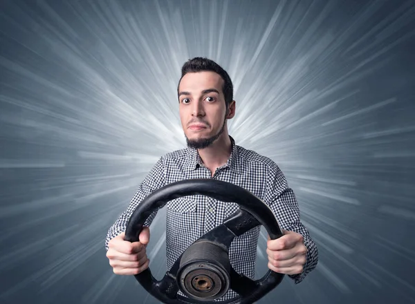 Man holding steering wheel — Stock Photo, Image