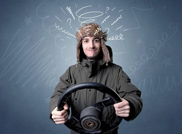 Muž držící volant — Stock fotografie