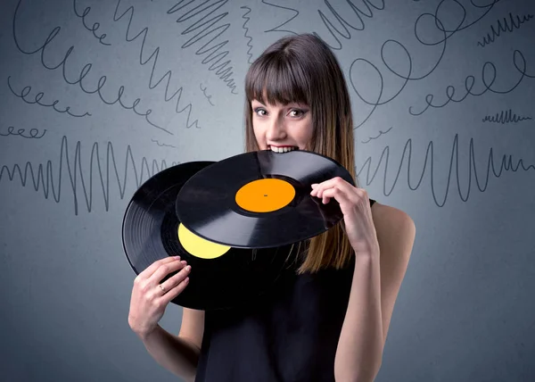 Lady holding vinyl record