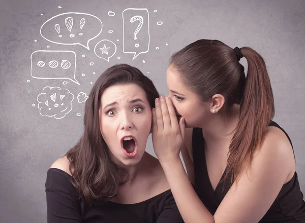 Girl telling secret things to her girlfriend — Stock Photo, Image