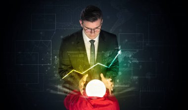 İşadamı borsa sihirli bir top ile geleceği tahmin