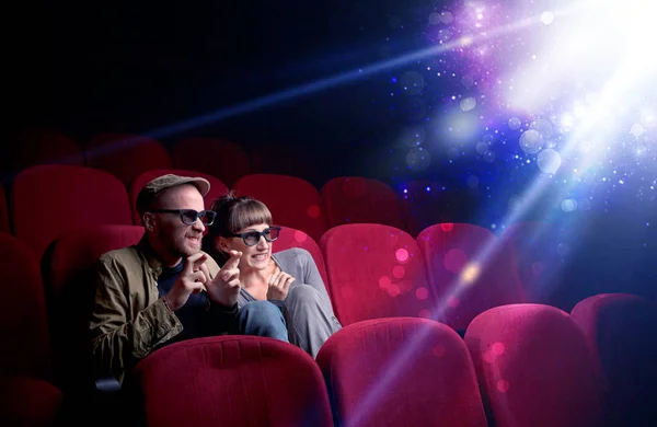 Romantic couple sitting at spectacle — Stock Photo, Image