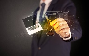 Grafikleriyle tuşu tutmakta işadamı