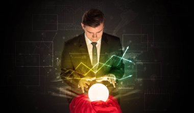 İşadamı borsa sihirli bir top ile geleceği tahmin