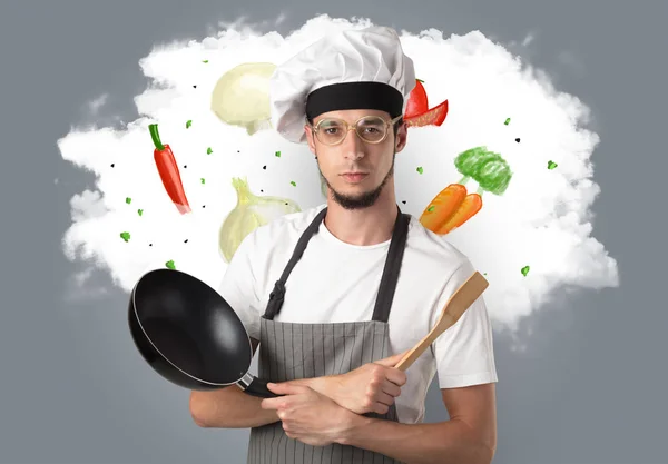 Légumes sur nuage avec cuisinier masculin — Photo