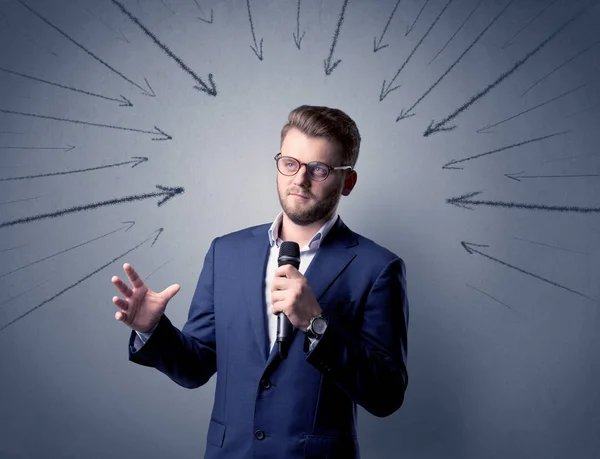 Businessman holding microphone — Stock Photo, Image